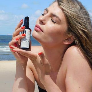 step 3 face oil elixir with e.g. black currants and green glass bottle